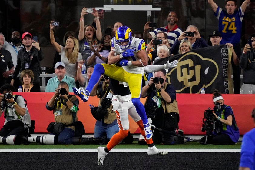 Los Angeles Rams wide receiver Cooper Kupp pulls in a touchdown catch as Cincinnati Bengals cornerback Eli Apple defends during the second half of the NFL Super Bowl 56 football game Sunday, Feb. 13, 2022, in Inglewood, Calif. (AP Photo/Julio Cortez)