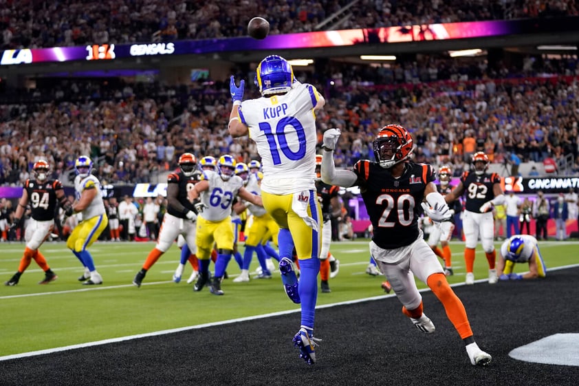 Los Angeles Rams wide receiver Cooper Kupp (10) catches a touchdown against Cincinnati Bengals cornerback Eli Apple (20) during the second half of the NFL Super Bowl 56 football game Sunday, Feb. 13, 2022, in Inglewood, Calif. (AP Photo/Marcio Jose Sanchez)