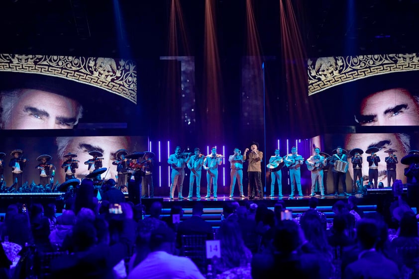 Christian Nodal performs during a tribute to the late Vicente Fernandez at Premio Lo Nuestro at FTX Arena in Miami on Thursday, Feb. 24, 2022. (AP Photo/Rebecca Blackwell)