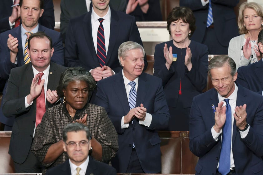 WASHINGTON, DC - MARCH 01: Republican Senators, including Sen. Mike Lee (R-UT), Sen. Lindsey Graham (R-SC), Sen. Susan Collins (R-ME), Sen. John Thune (R-SD) and U.S. Ambassador to the UN Linda Thomas-Greenfield applaud as U.S. President Joe Biden delivers the State of the Union address during a joint session of Congress in the U.S. Capitol's House Chamber March 01, 2022 in Washington, DC. During his first State of the Union address Biden spoke on his administration's efforts to lead a global response to the Russian invasion of Ukraine, work to curb inflation and to bring the country out of the COVID-19 pandemic. (Photo by Win McNamee/Getty Images)