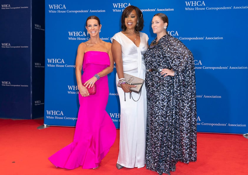 Stephanie Ruhle, Gayle King and Drew Barrymore poses for photographers as they arrive to the annual White House Correspondents Association Dinner in Washington, Saturday, April 30, 2022. (AP Photo/Jose Luis Magana)