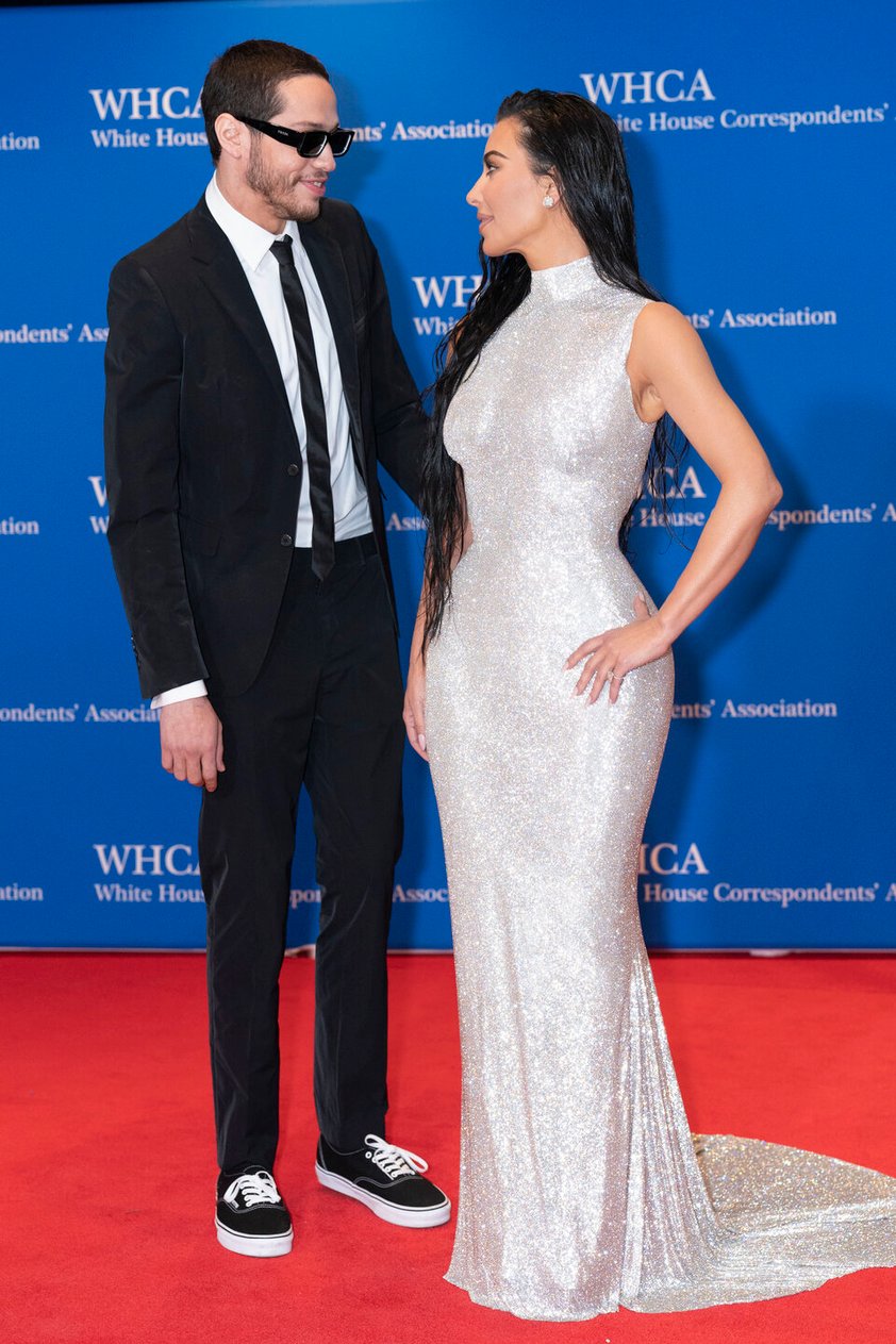 Kim Kardashian and Pete Davidson pose for photographers as they arrive to the annual White House Correspondents' Association Dinner in Washington, Saturday, April 30, 2022. (AP Photo/Jose Luis Magana)