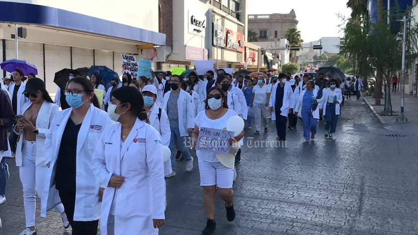 Marchan en silencio para exigir justicia por el asesinato del pasante de Medicina Eric Andrade