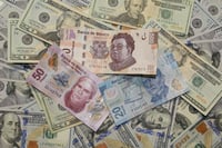 Peso cierra débil frente al dólar por crisis de Evergrande, principal desarrollador de bienes raíces en China