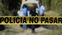 Cinta amarilla con el texto 'policía no pasar'. (ARCHIVO)