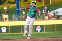 Ulises Ortíz fue el encargado de sellar el triunfo mexicano en la Serie Mundial con un batazo al jardín izquierdo. (AP)