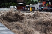 El río Huacapa tras el paso del huracán 'John', este jueves, en el municipio de Chilpancingo, en el estado de Guerrero. (AGENCIAS)