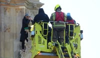 Imagen Arrestan a hombre que escaló el Big Ben con bandera palestina