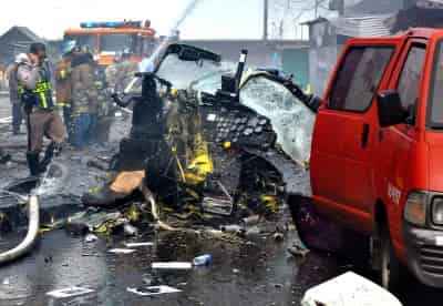 Restos del helicóptero donde el general director de Policía de Chile, José Alejandro Bernales, murió, al estrellarse en una zona comercial en la ciudad de Panamá. (EFE)