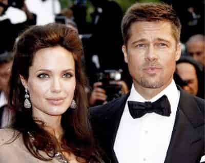 Brad es un gran fan de U2, y Angelina se lleva muy bien con la mujer de Bono. (Archivo)
