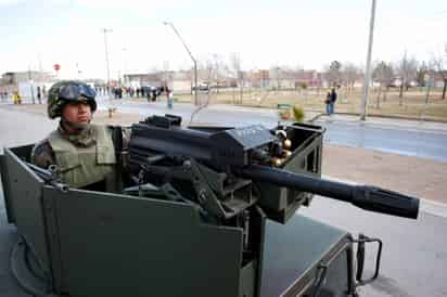 Vigilancia. Militares patrullan las calles de Ciudad Juárez ante la ola de violencia.