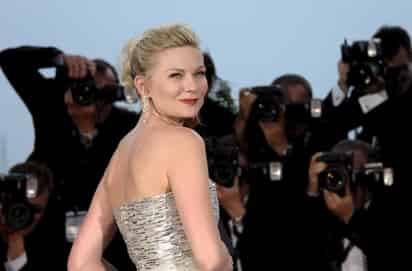 Kirsten Dunst, ganadora del premio a Mejor Actriz en el Festival Cannes 2011, por su trabajo en el filme 'Melancholia', festejará este martes su cumpleaños 31, con el estreno de los filmes “Un amor entre dos mundos” y “On the Road”. ARCHIVO