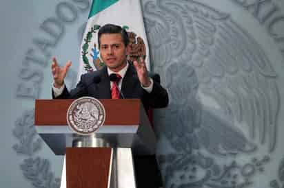 El presidente Enrique Peña Nieto dijo que México es una economía abierta, que compite a nivel global, comprometida con el libre comercio y la integración productiva, y el mundo debe saberlo. (ARCHIVO)