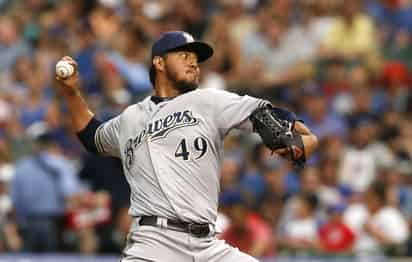 El mexicano Yovani Gallardo brilló en una labor de siete entradas. (AP)