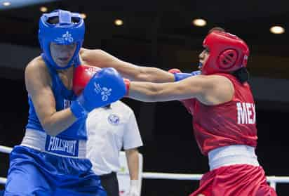 Victoria Torres (der) en su duelo contra Dayana Sánchez. (EFE)