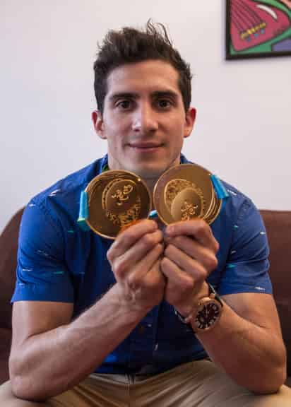 Rommel Pacheco y las dos medallas obtenidas en los Juegos Panamericanos de Toronto 2015. Rommel Pacheco, a despuntar en el Mundial de Kazán