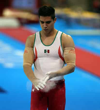 En Londres 2012 Corral se quedó cerca de las medallas al ubicarse en el quinto puesto en la prueba de barras paralelas. (ARCHIVO)