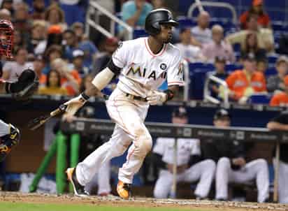 Dee Gordon bateó para .308 con 114 carreras anotadas y 33 impulsadas la campaña pasada con los Marlines de Miami. (Archivo)