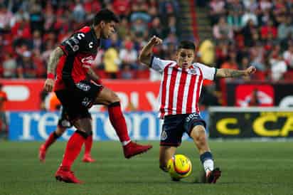 Gustavo Bou (i), del Tijuana, durante el juego de la Jornada 15 del Torneo Clausura 2018 en el Estadio Caliente. 