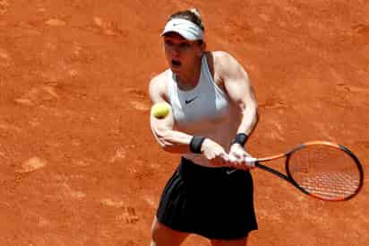 Simona Halep derrotó 6-0, 6-3 a Elise Mertens para avanzar a los octavos de final. (EFE)