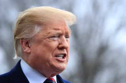 'Hemos estado golpeando al EI muy fuerte en las últimas tres semanas', dijo Trump en declaraciones a los periodistas antes de partir a Dover. (AP)