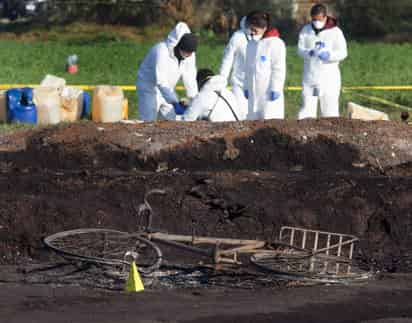 Para los 54 restantes se encuentran en un estado de calcinación que hace imposible la identificación, por lo que se requerirá que sean evaluados con pruebas genéticas. (EFE)