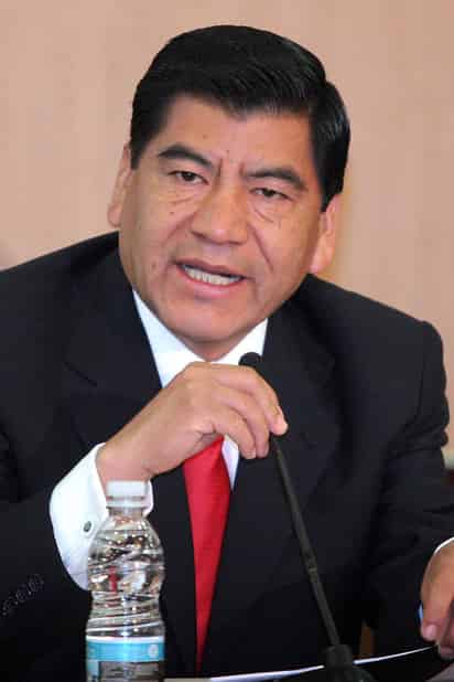 El ex gobernador de Puebla, Mario Marín y el empresario textilero Kamel Nacif son buscados por la Interpol en más de 190 países; ambos están acusado de tortura en contra de la periodista, Lydia Cacho. (ARCHIVO)