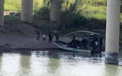 Elementos del Instituto Nacional de Migración y personal de la Secretaría de la Defensa Nacional mantienen vigilancia tanto en el punto de revisión del Ejército Mexicano sobre la carretera federal número 2 como en la orilla del río Bravo. (ARCHIVO)