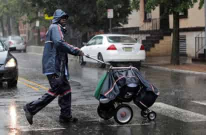 Debido a 'Laura', Puerto Rico se encuentra bajo aviso de tormenta tropical y vigilancia de inundaciones repentinas debido a las lluvias y se esperan condiciones de vientos en ráfagas con intensidad de tormenta tropical.
(AP)