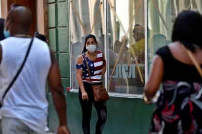Cuba sumó este jueves 58 nuevos contagios de COVID-19, entre ellos 11 cubanos y 15 turistas rusos con casos importados del virus, que por primera vez en meses se detecta en la oriental Santiago de Cuba. (ARCHIVO) 
