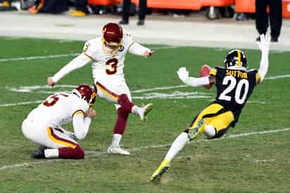 Dustin Hopkins anotó dos goles de campo en los últimos minutos para darle el triunfo a Washington. (AP)