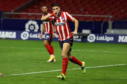 Luis Suárez tratará de hacerse presente en el marcador en el duelo de hoy en el Wanda Metropolitano. (EFE)