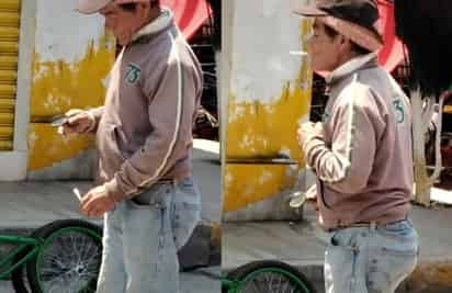 Sin ayuda de cigarros o un encendedor, el hombre enciende su cigarro sólo con la ayuda de una lupa y el Sol (CAPTURA) 