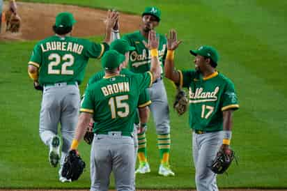 Los Atléticos de Oakland derrotaron 5-3 a los Yanquis de Nueva York para lograr su séptima victoria consecutiva. (AP)