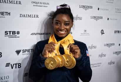 Hay un fenómeno que se produce cada vez que Simone Biles aparece en las pantallas del Power Moves Gymnastics & Fitness.
(EFE)