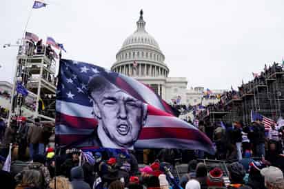 'Si me postulo y gano, trataremos a esa gente del 6 de enero con justicia', declaró Trump. (ARCHIVO)