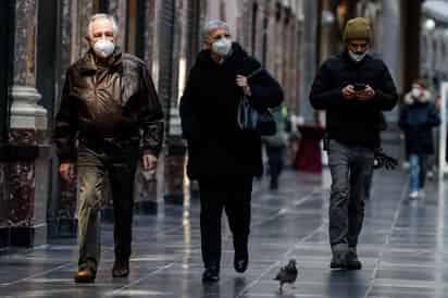 El gobierno anunció el viernes que el país de 11 millones de habitantes pasará del nivel rojo, el más severo de restricciones por el COVID-19, a naranja a partir del 19 de febrero. (ARCHIVO)