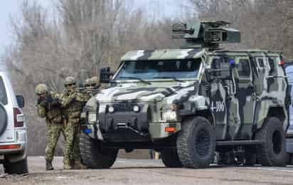 El anuncio sobre el regreso a las bases de parte de los militares desplegados cerca de la frontera ucraniana coincidió con la visita a Moscú del canciller alemán Olaf Scholz y su reunión con el presidente ruso, Vladímir Putin. (ARCHIVO)