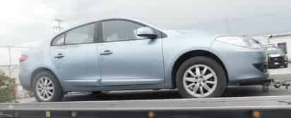 Se trata de un vehículo sedán de la marca Renault.