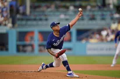 Julio Urías permitió una carrera limpia en siete entradas de trabajo, en el
triunfo de Dodgers 3-1 sobre Marlines de Miami. (AP)