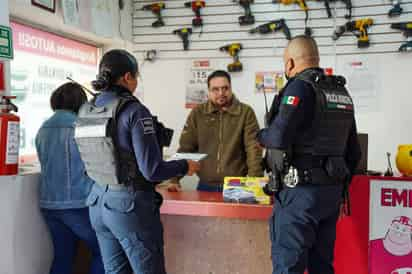 La presencia policial se aumentó en zonas comerciales y bancos. (EL SIGLO DE TORREÓN)