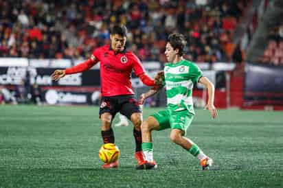 Santos Laguna de forma cardiáca, logró rescatar en punto en su visita a los Xolos de Tijuana. (Foto: Especial)