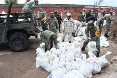 El Ejército Mexicano y Guardia Nacional mantienen el apoyo a la población afectada. (FERNANDO COMPEÁN)