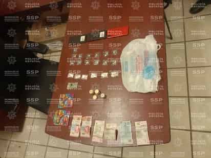 Aseguran bolsa con drogas, teléfonos celulares y dinero en Lerdo