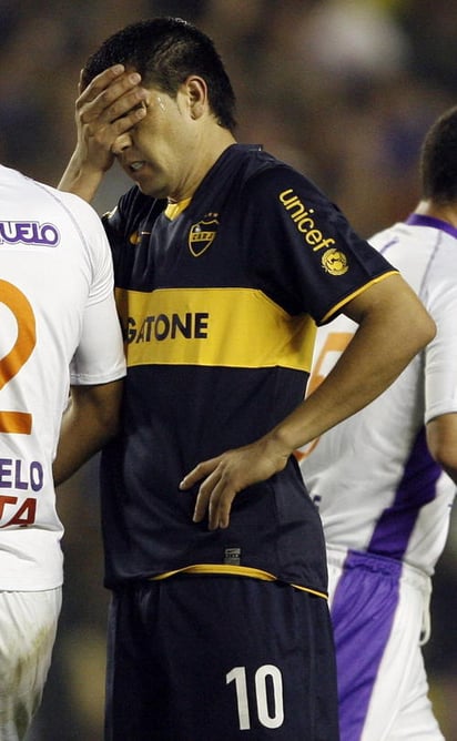 Juan Román Riquelme podría dejar a su amado Boca Juniors, ya que el Corinthians de Brasil hará una oferta para contar con sus servicios. El argentino afirmó que de quedarse en Boca no cobraría por jugar. (EFE)