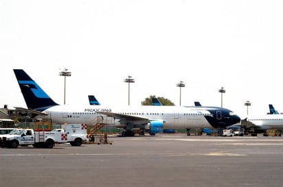 Sin operar. Hoy se cumplen dos años que Mexicana de Aviación dejó de operar sus vuelos a nivel nacional e internacional. (ARCHIVO)