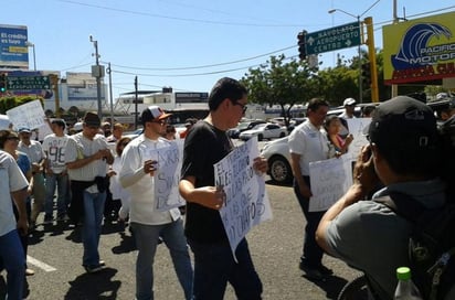 Marcha. Un grupo de personas protesta en las calles.