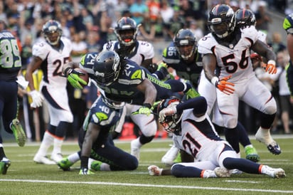 Seattle venció con marcador 26-20 a Broncos de Denver. (AP)