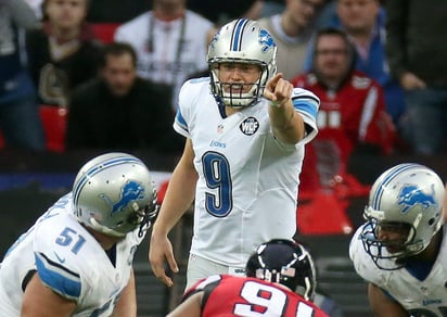 Mathew Stafford y los Leones de Detroit buscarán parar a Tom Brady y compañía hoy domingo. (EFE)