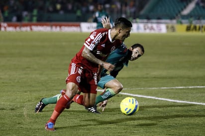 Richard Ruiz (i), del Tijuana, y Emiliano Armenteros. (Jam Media)